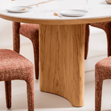 Lucerne oval ceramic dining table with softly rounded capsule-shaped edges