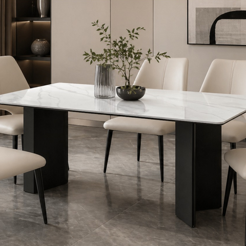 Vecta white sintered stone dining table with Calacatta-inspired veining and matte black V-pillar pedestal base