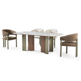 Vionno dining table featuring marble-inspired gold and grey veining on white stone top